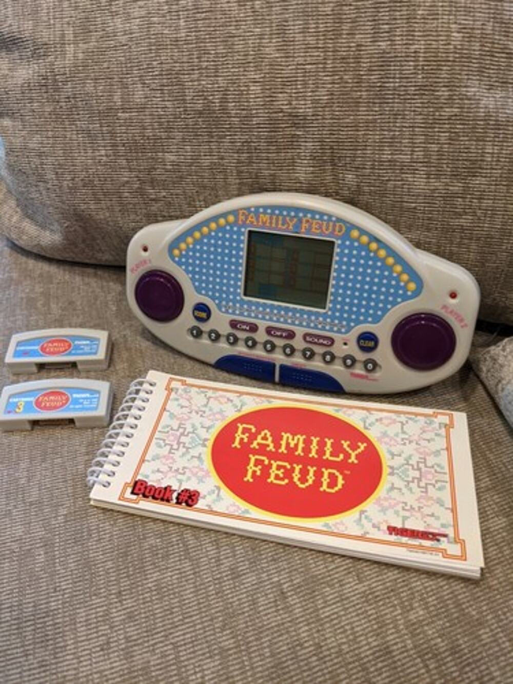 1997 VTG Tiger Electronics Family Feud HandGame w/ 2 Cartridges & Survey Book